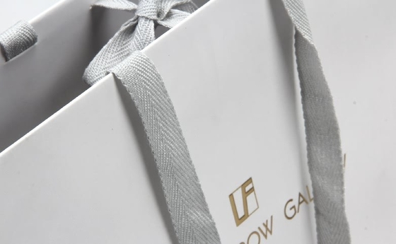 Sacchetti di carta bianchi personalizzati Occhiali di fascia alta Shopping Sacchetti di carta